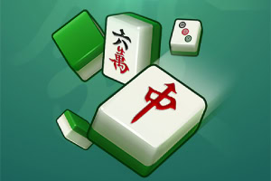 Mahjong-Spielsteine auf grünem Hintergrund